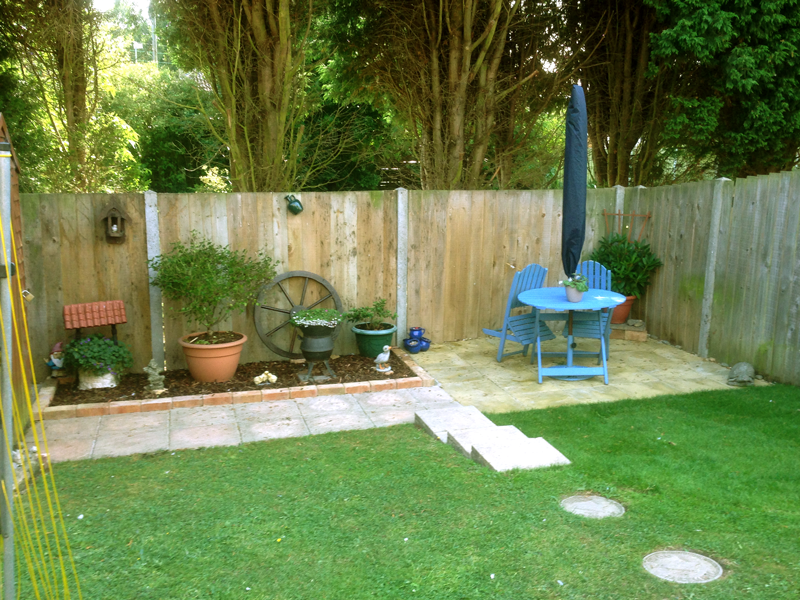 The same garden finished with a new patio seating area