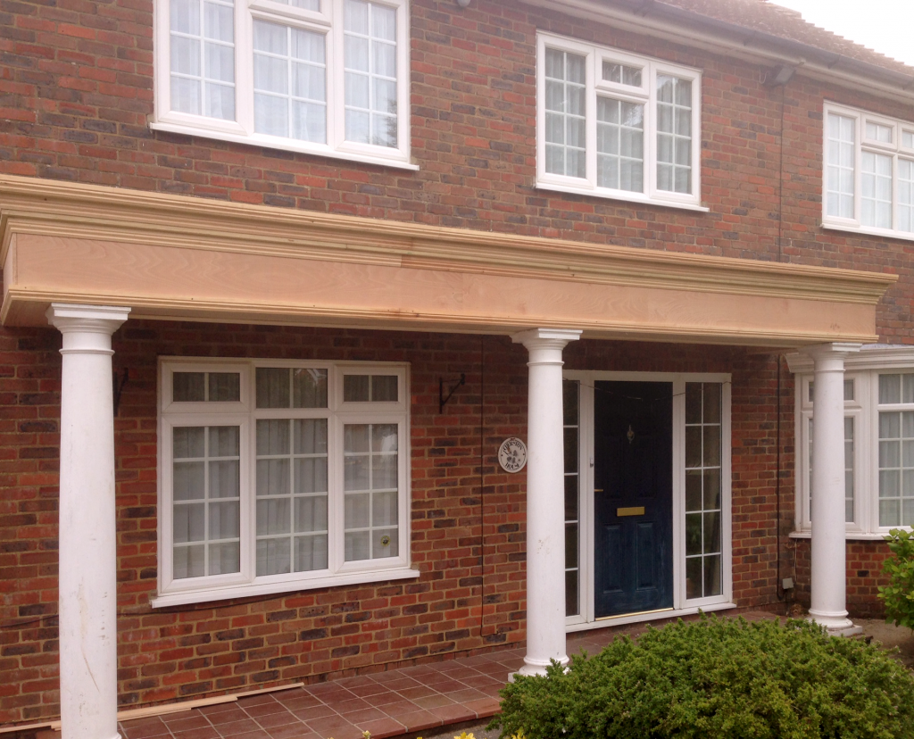 New timber porch beam and columns fitted to the front of a house
