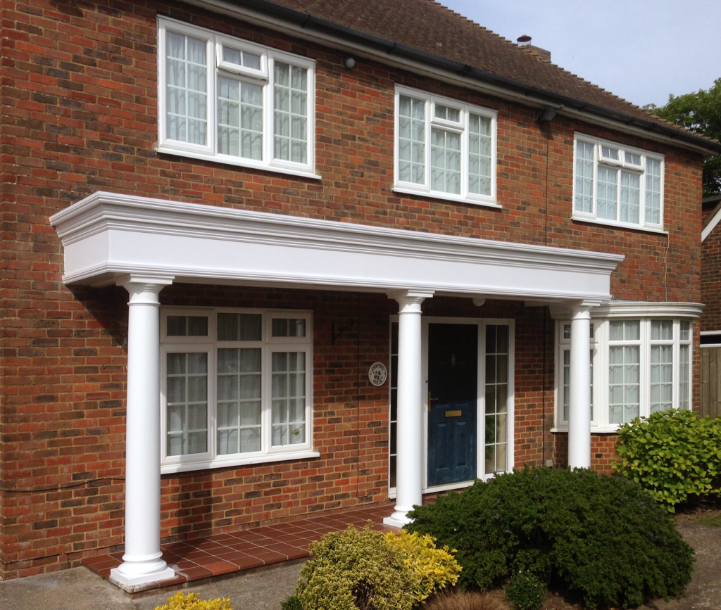 Finished white columned porch, painted and decorated
