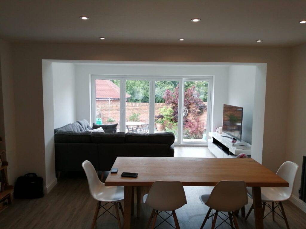 Bright open-plan living and dining room completed by J Burgoyne Limited