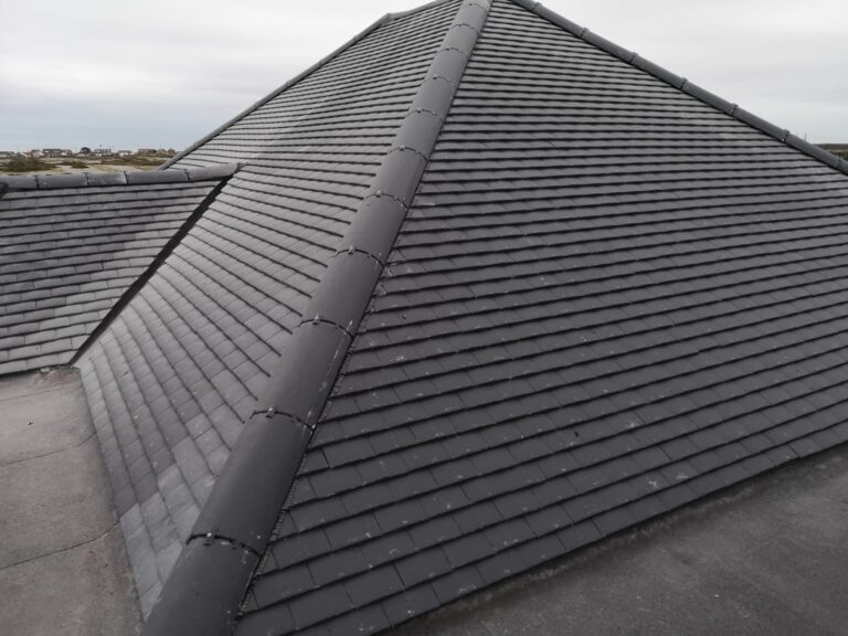 Newly tiled pitched roof completed by J Burgoyne Limited